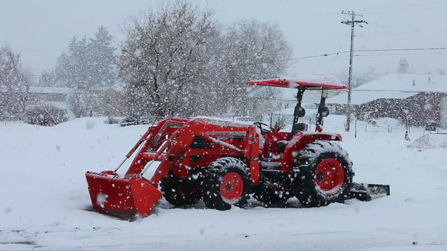 Tractor farm in snow blizzard P HD 8652