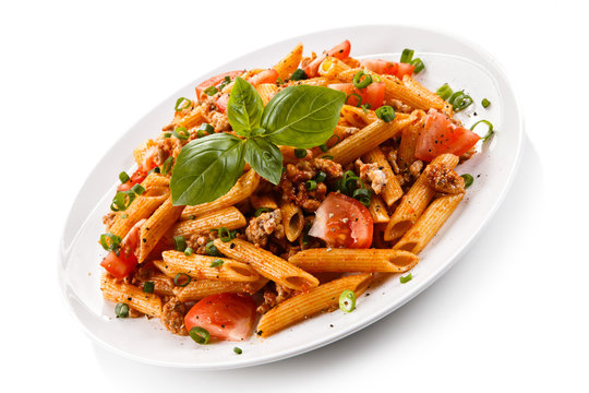 Penne with meat, tomato sauce and vegetables 