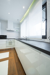 Interior of a modern luxury bright white kitchen