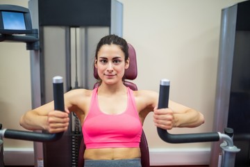 Determined woman working out