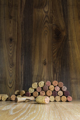 wine cork on a background of boards and corkscrew