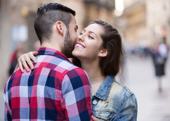 Fototapeta premium Happy girl hugging her male