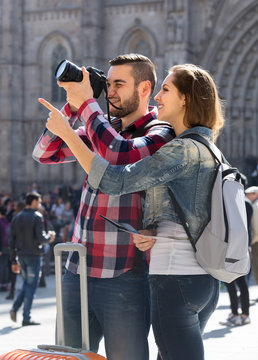 Happy Tourists Seeing Sights