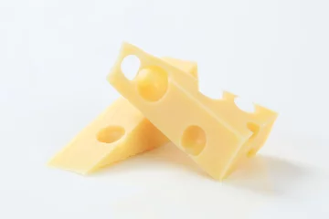 Crédence de cuisine en verre imprimé Produits laitiers pieces of Emmentaler cheese