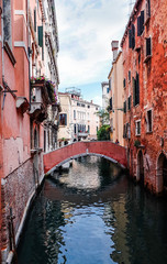 Fototapeta na wymiar Beautiful view of water street and old buildings in Venice