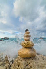 Fototapeta na wymiar Stack of stones on the beach
