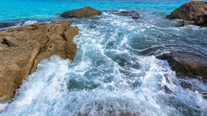 Beautiful landscape blue sea and white waves near the rocks during summer at Koh Miang island in Mu Ko Similan National Park, Phang Nga province, Thailand, 16:9 widescreen