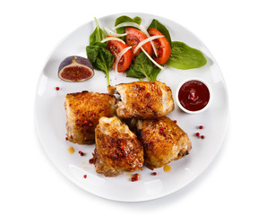 Roasted chicken drumsticks and vegetables