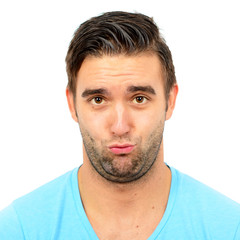 Obraz premium Portrait of clueless man against white background