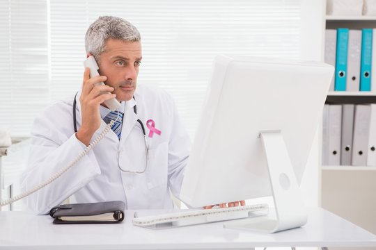 Composite image of pink breast cancer awareness ribbon