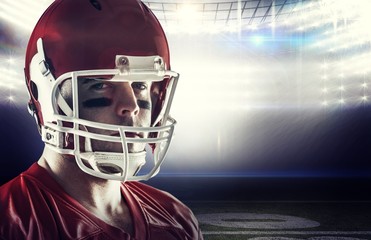 Composite image of american football player looking at camera