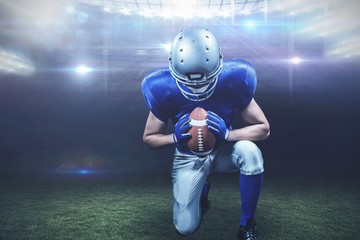 Composite image of american football player kneeling