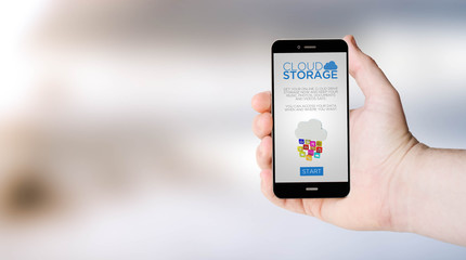 mobile phone cloud storage online on user´s hand