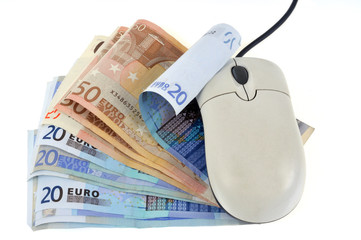 La souris d&rsquo;ordinateur et les billets de banque