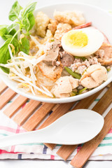 Pork rice noodle soup with meat ball, egg and vegetable