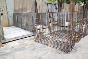 Metal rebar and concrete casted drain blocks at construction sit