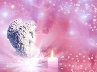an angel statue over mystical sky with divine light and stars