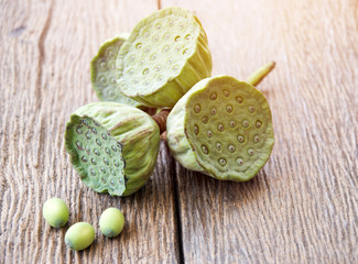 Lotus seeds or Lotus nuts preparing on wooden background ,Thai food and ingredient of Chinese dessert.