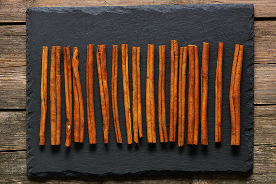 Cinnamon sticks on slate