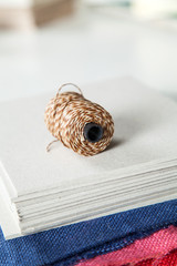 Obraz premium Thread On Papers In Factory