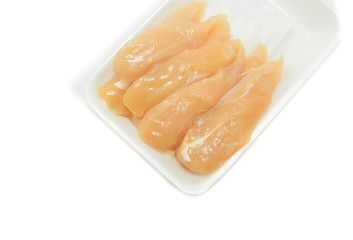 raw chicken meat in plastic tray  on white background