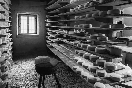 Alpine hut that produces  homemade cheeses.