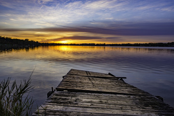Fototapeta premium Broken dock and amazing sunset