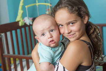 Fototapeta na wymiar Cute newborn baby with his sister