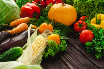 Fresh vegetables on a wooden table.