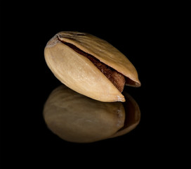 Dried pistachio with reflection