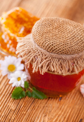 Fototapeta na wymiar Fresh honey in jar