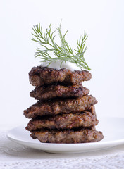 liver pancakes pile decorated dill