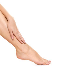 woman legs isolated on white. Depilation or another healths concept