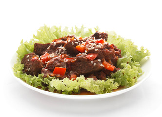 Spicy beef in tomato sauce. Isolated photo.
