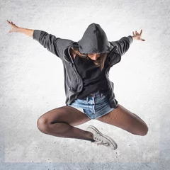 Deurstickers Teenager hip-hop dancer jumping © luismolinero