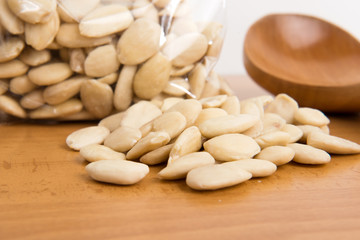 Almonds on wooden stand