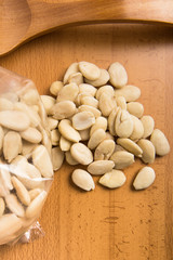 Almonds on wooden stand