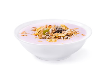 Muesli with yoghurt and fruit pieces isolated on white backgroun