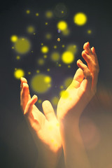 Light in human hands in the dark,  miracle concept