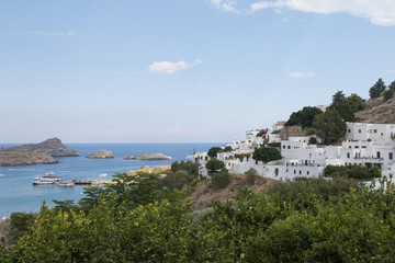 Fototapeta na wymiar The white houses of Lindos in Rhodes island