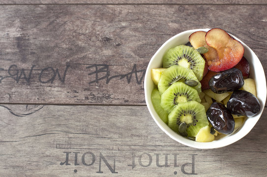 A bowl of fruits
Bowl filled with fresh fruits, dried fruits, nuts.