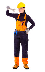 Beautiful young woman in hardhat wearing tool belt and holding w