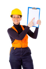 Portrait of happy smiling woman builder in yellow helmet, holding in hand  notepad, looking to camera, isolated white background.