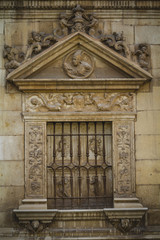 Fototapeta na wymiar Iron window, Spanish town of Alcala de Henares, palaces and anci