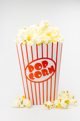 Classic box cinema popcorn on white background..