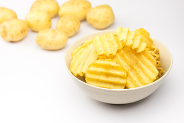 Potato chips on white background..