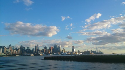 Fototapeta na wymiar Pier on Hudson River and NYC Skyline