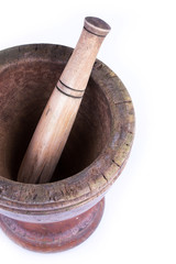 wooden mortar and pestle isolated on white background