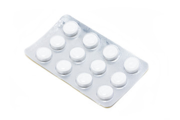 Tablets pills isolated on white background.