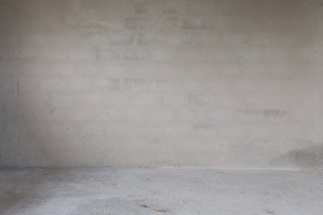 plaster mortar wall and cement floor in construction site